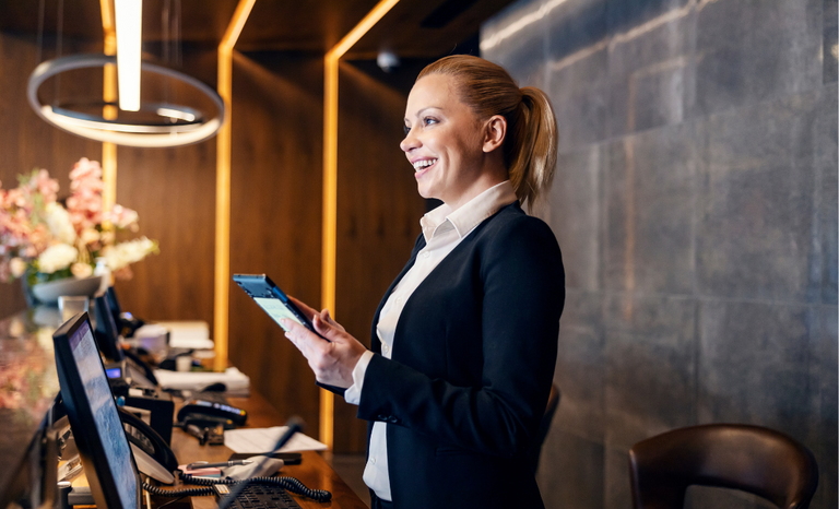 Hotel Reception Desk Female Tablet